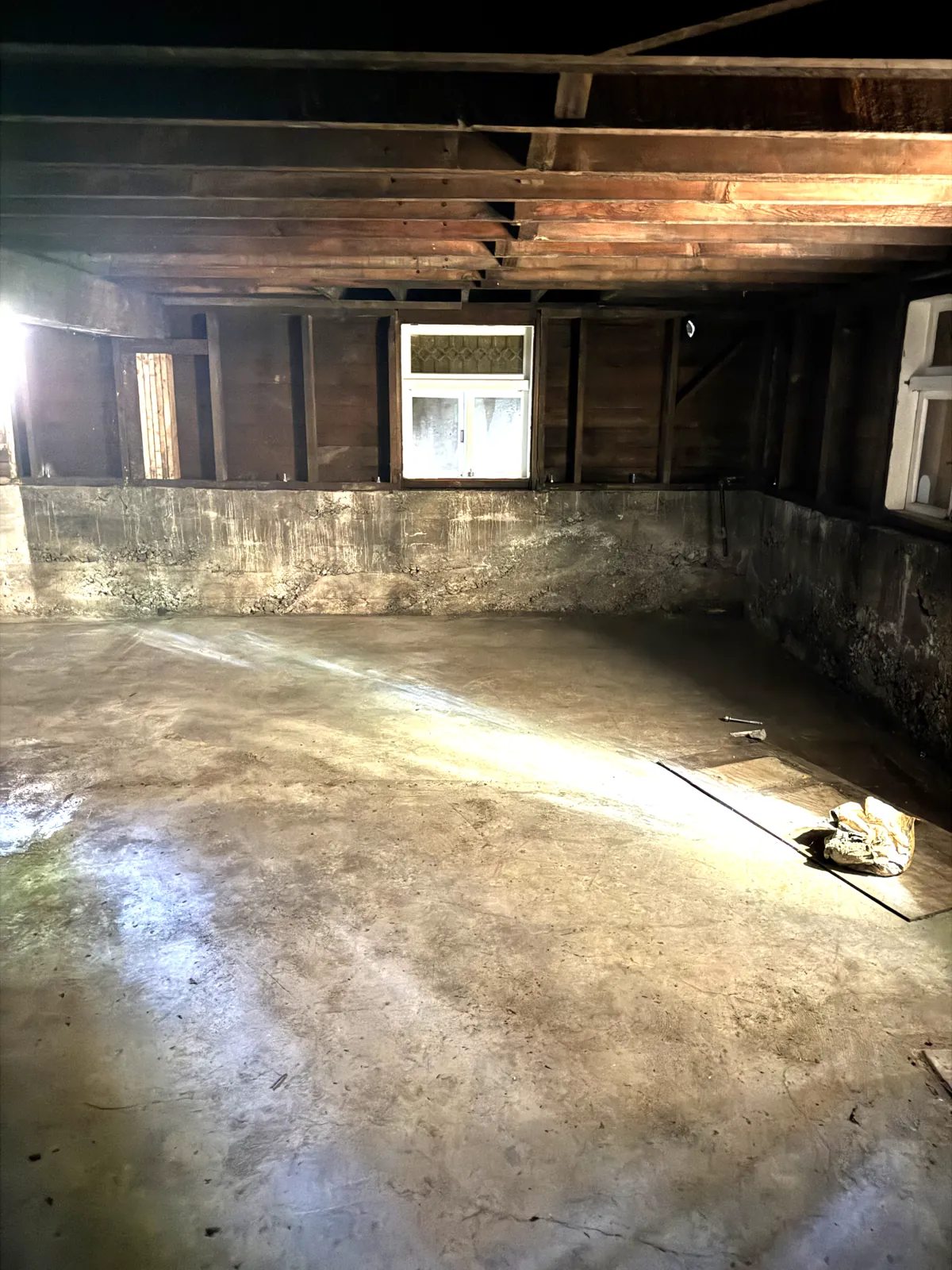 Basement of the same house, with original windows still in place