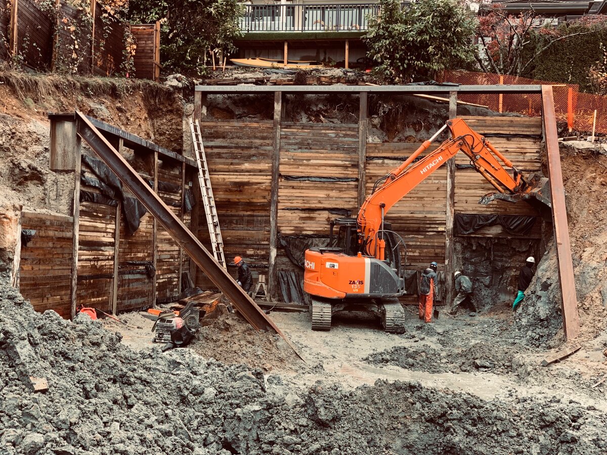 Pile driving and shoring support for neighbouring property during deep excavation in West Vancouver clay soil conditions