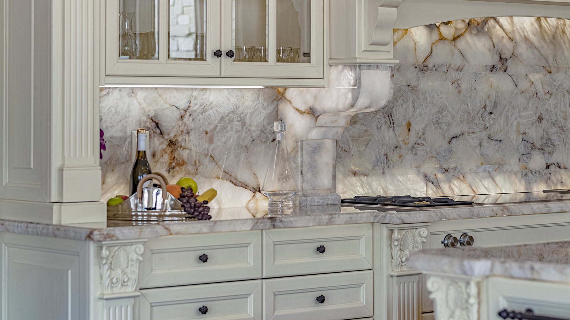 Altamont's Muse kitchen detail with backlit onyx backsplash in West Vancouver