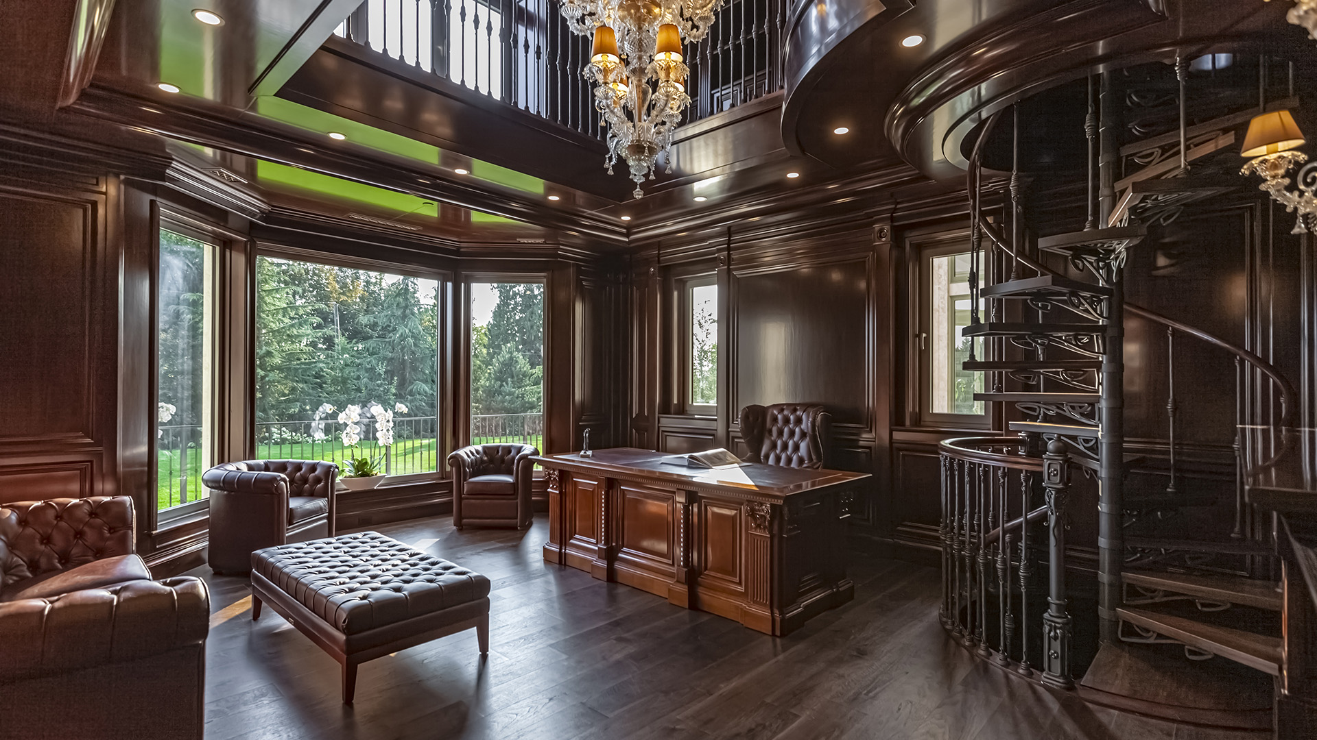 Altamont's Muse executive study with spiral staircase and mahogany paneling in West Vancouver