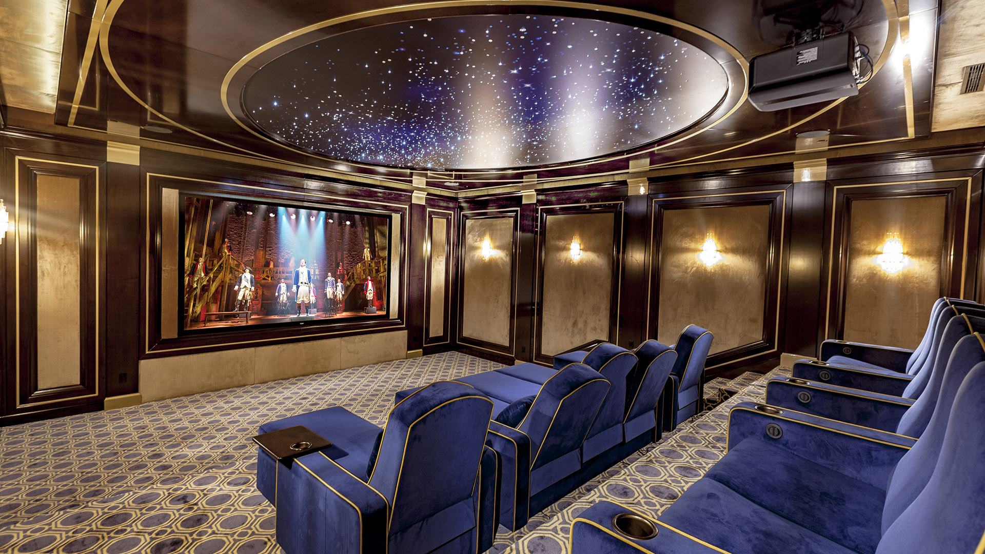 Altamont's Muse home theatre with star ceiling and blue velvet seating in West Vancouver