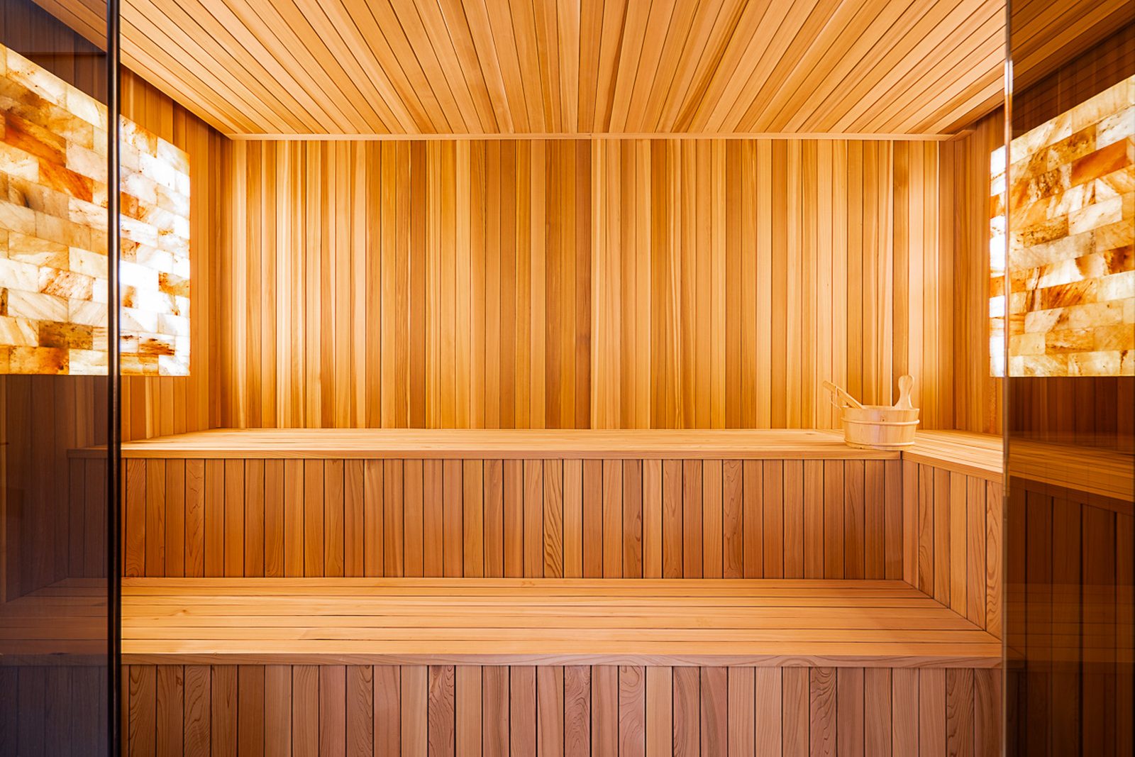 Powder room with calacatta marble walls floating oak vanity and LED mirror The Butterfly Altamont West Vancouver