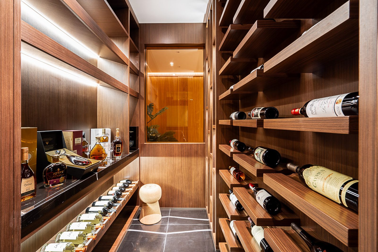 Temperature-controlled wine cellar with walnut horizontal racking and LED lighting The Butterfly Altamont