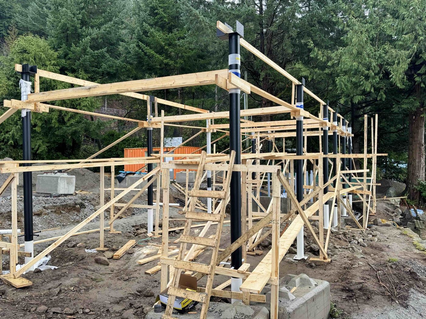 Steel column and timber frame construction at Lions Bay Beach Park by Eurohouse Construction
