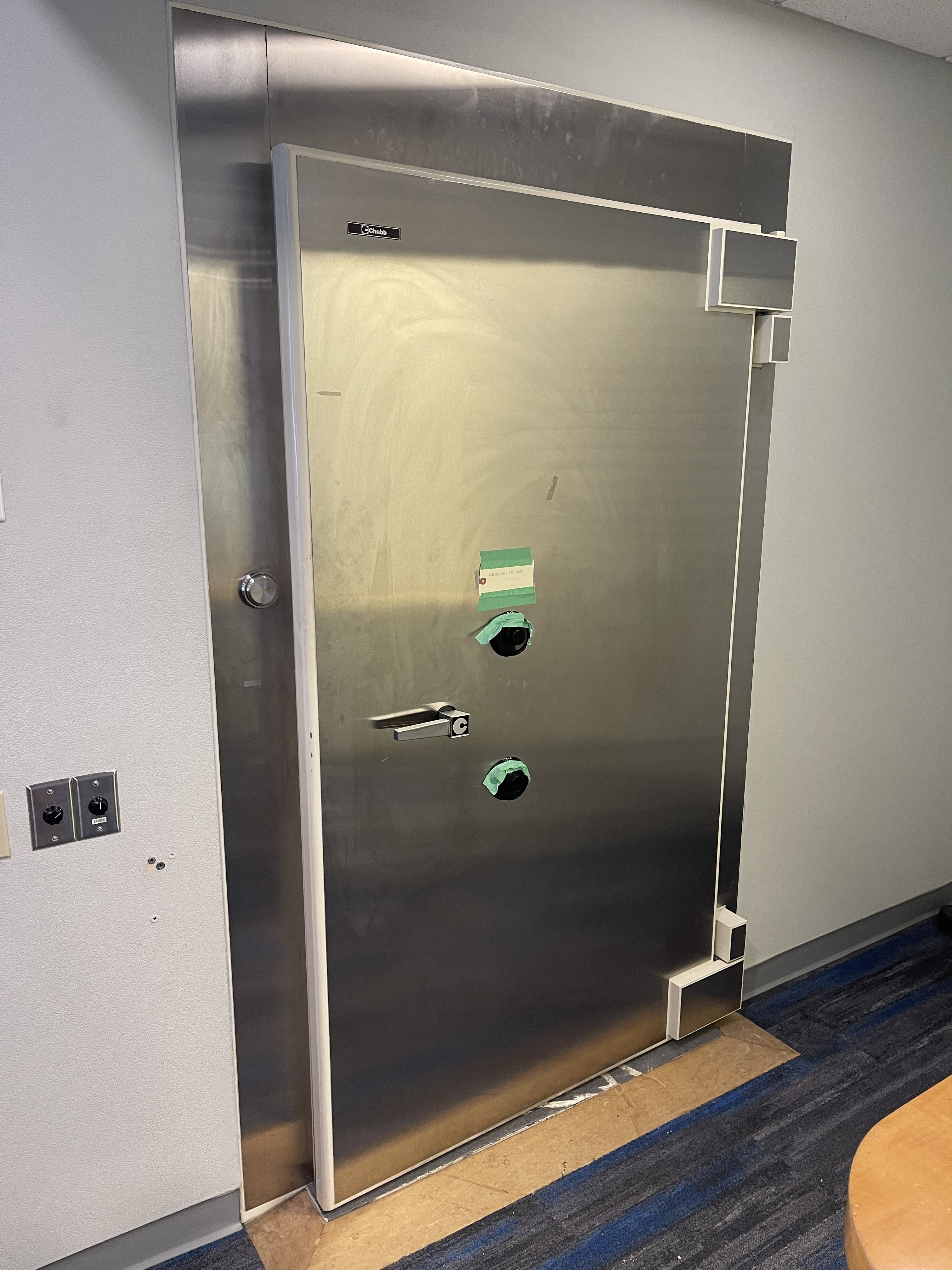 Chubb vault door retained during commercial tenant improvement — 1702 Marine Drive West Vancouver