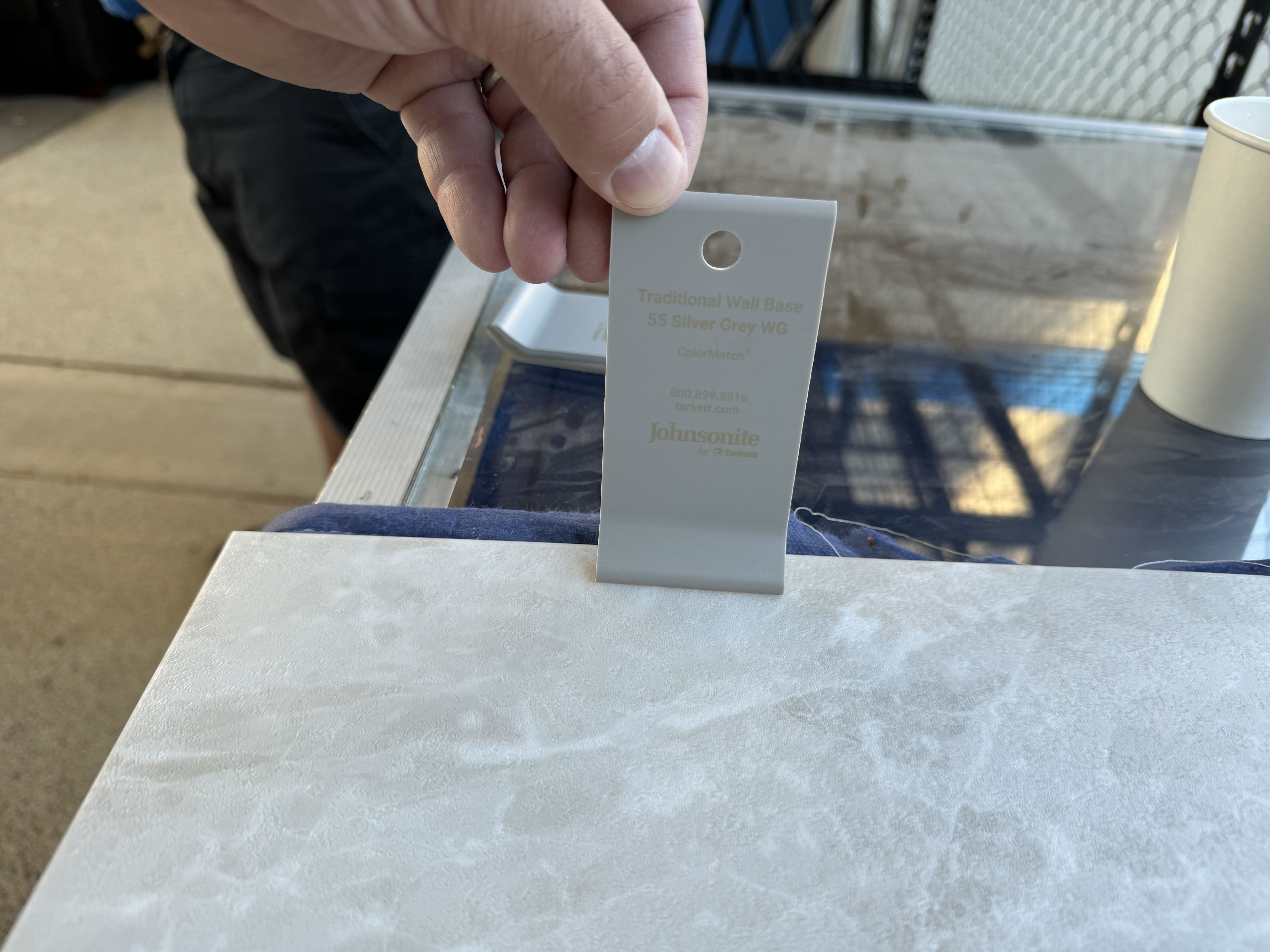 Material selection — Johnsonite wall base sample colour-matched to new flooring