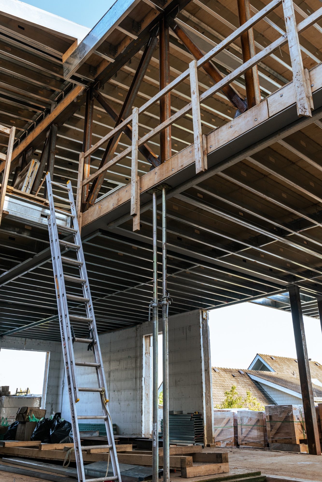 Wingline House construction — timber and steel hybrid frame with concrete shear walls and metal deck by Eurohouse Construction